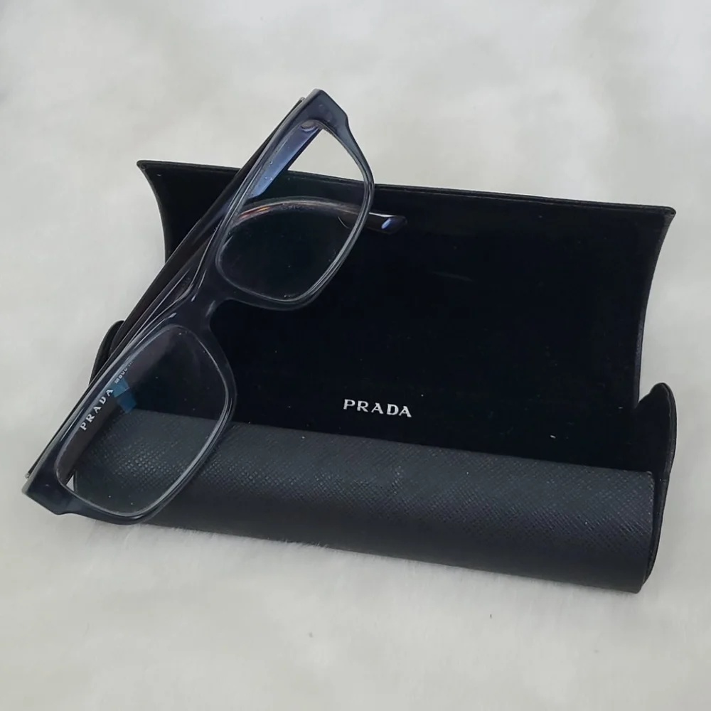 Prada glasses and leather case made in Italy